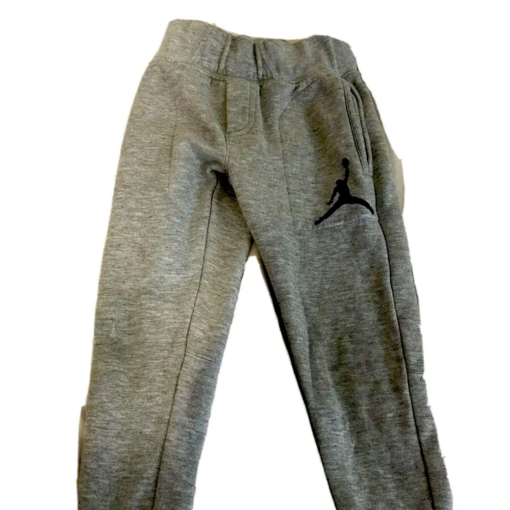 Nike jumpman logo air jordan tapered fleece joggers boys.